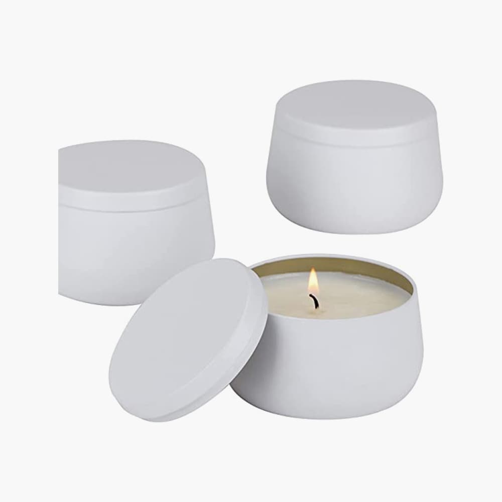 white metal candle jars