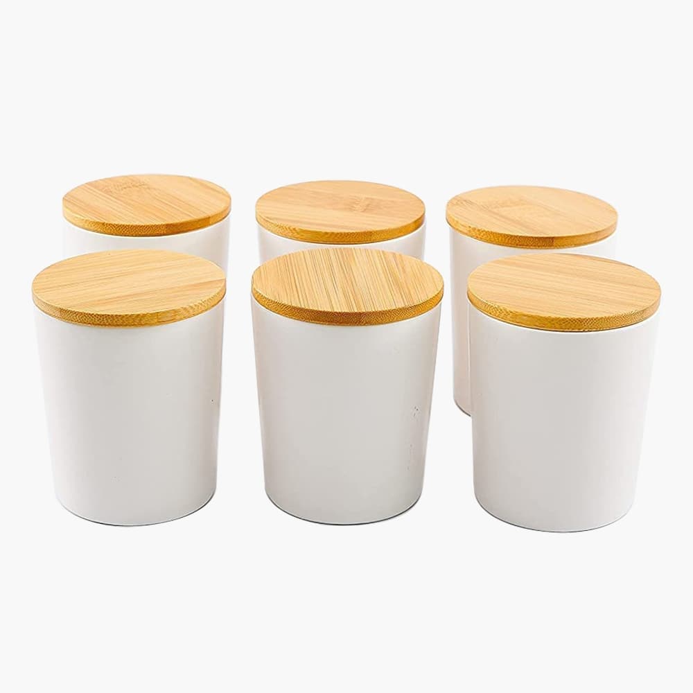 white candle jar with bamboo lids