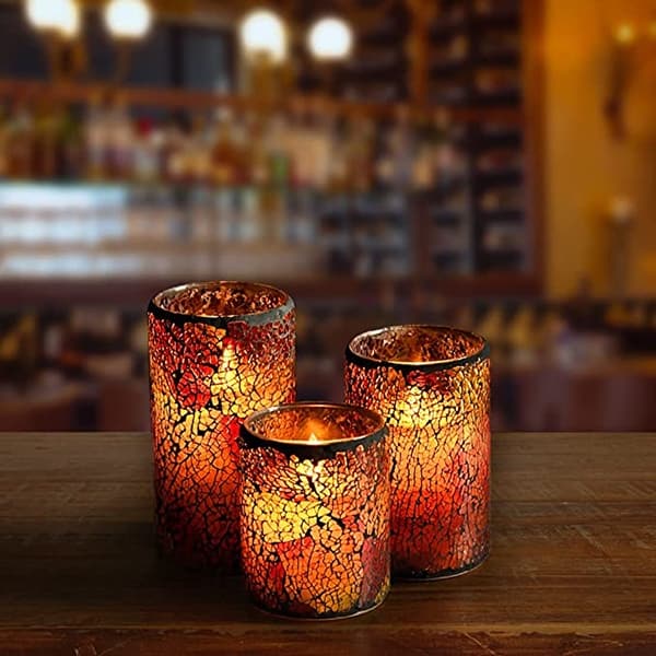 red candle jars  in bar