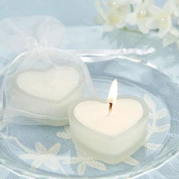 white heart shaped candle jar