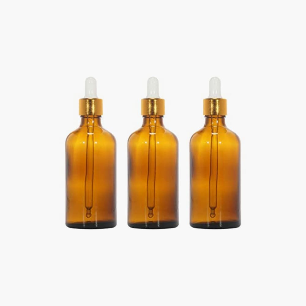 orange perfume oil bottles