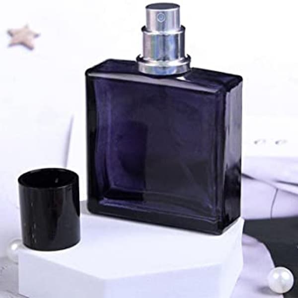 black perfume bottle with cap
