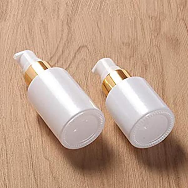 white cosmetic lotion bottles