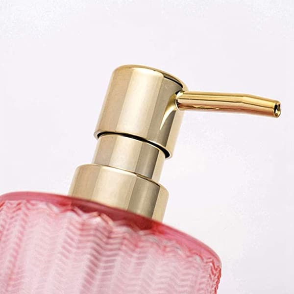 pink lotion bottle with metal pump