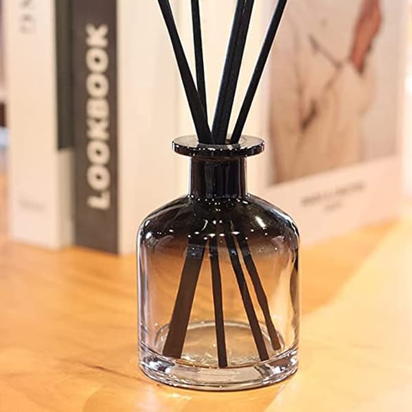 empty reed diffuser bottle in study