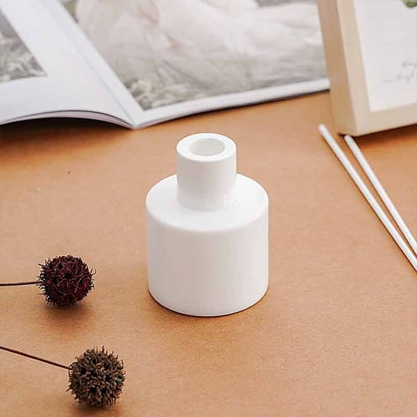 white diffuser bottle on desk