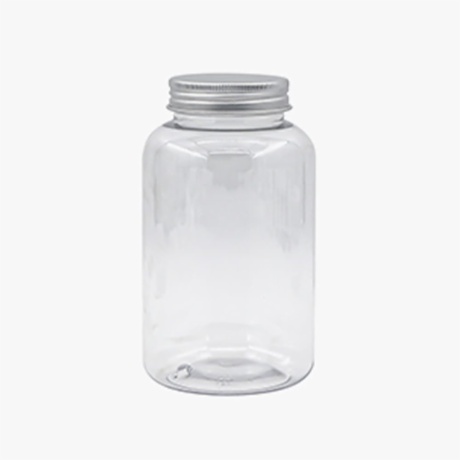 round empty juice bottle