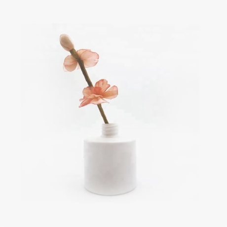 decorative white diffuser bottle