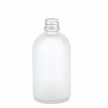 round glass juice bottle