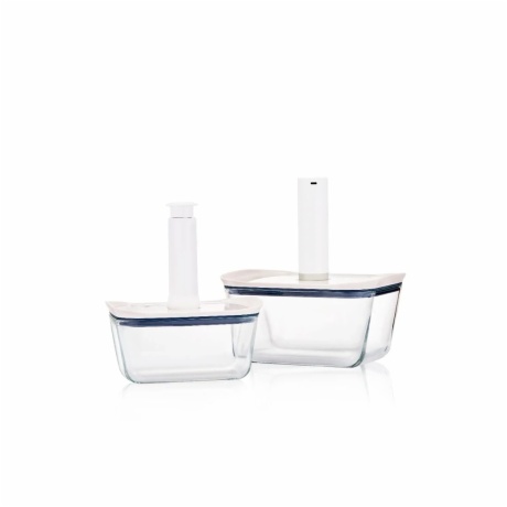 two white lid vacuum glass containers being pumped
